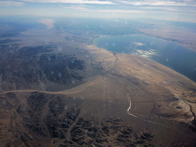 The south end of the Salton Sea, through a (very dirty) plane window